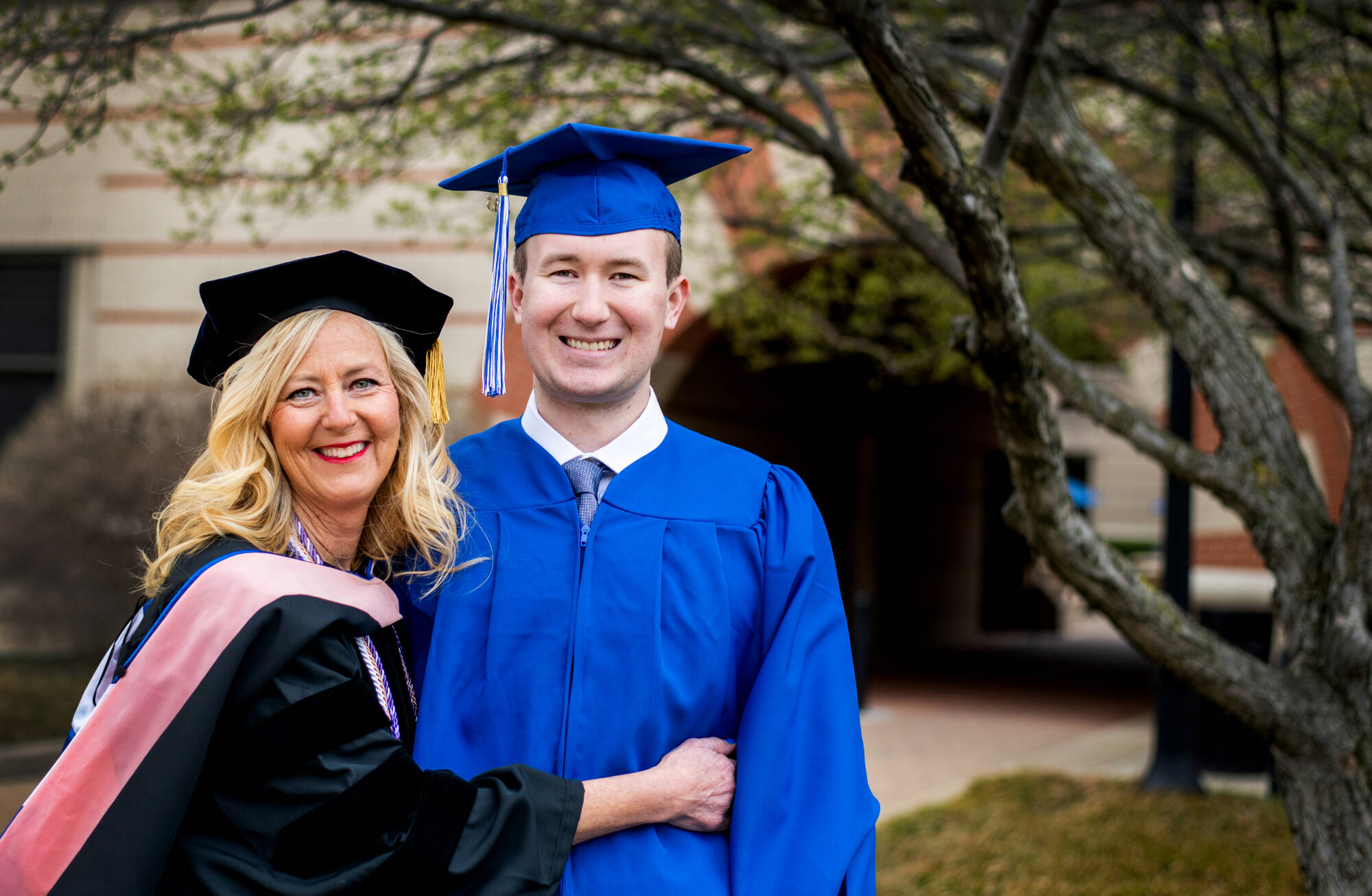 Kristi Cooper, left, will be getting a master’s degree in public health at the same time that her son, Sam Cooper, will be getting his undergraduate degree in supply chain management and finance. They will walk together in the Saturday morning ceremo...